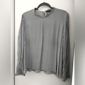 Zara Black and white patterned blouse.